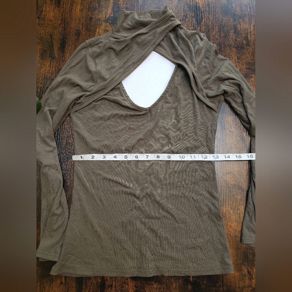 soft, stretchy, ribbed cutout peekaboo crossover turtleneck
